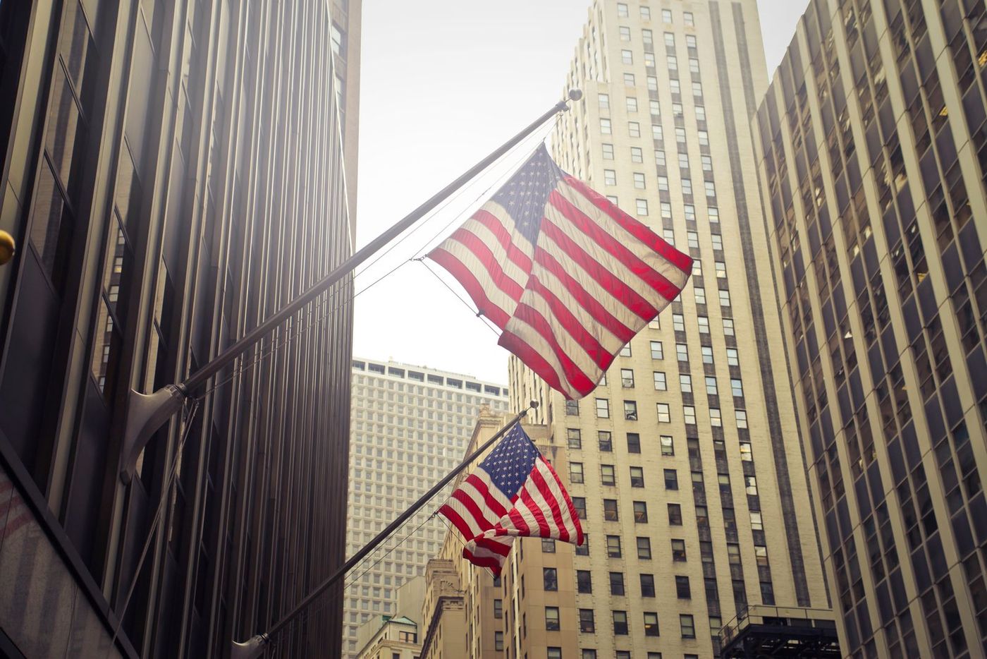 American flags on a downtown office building