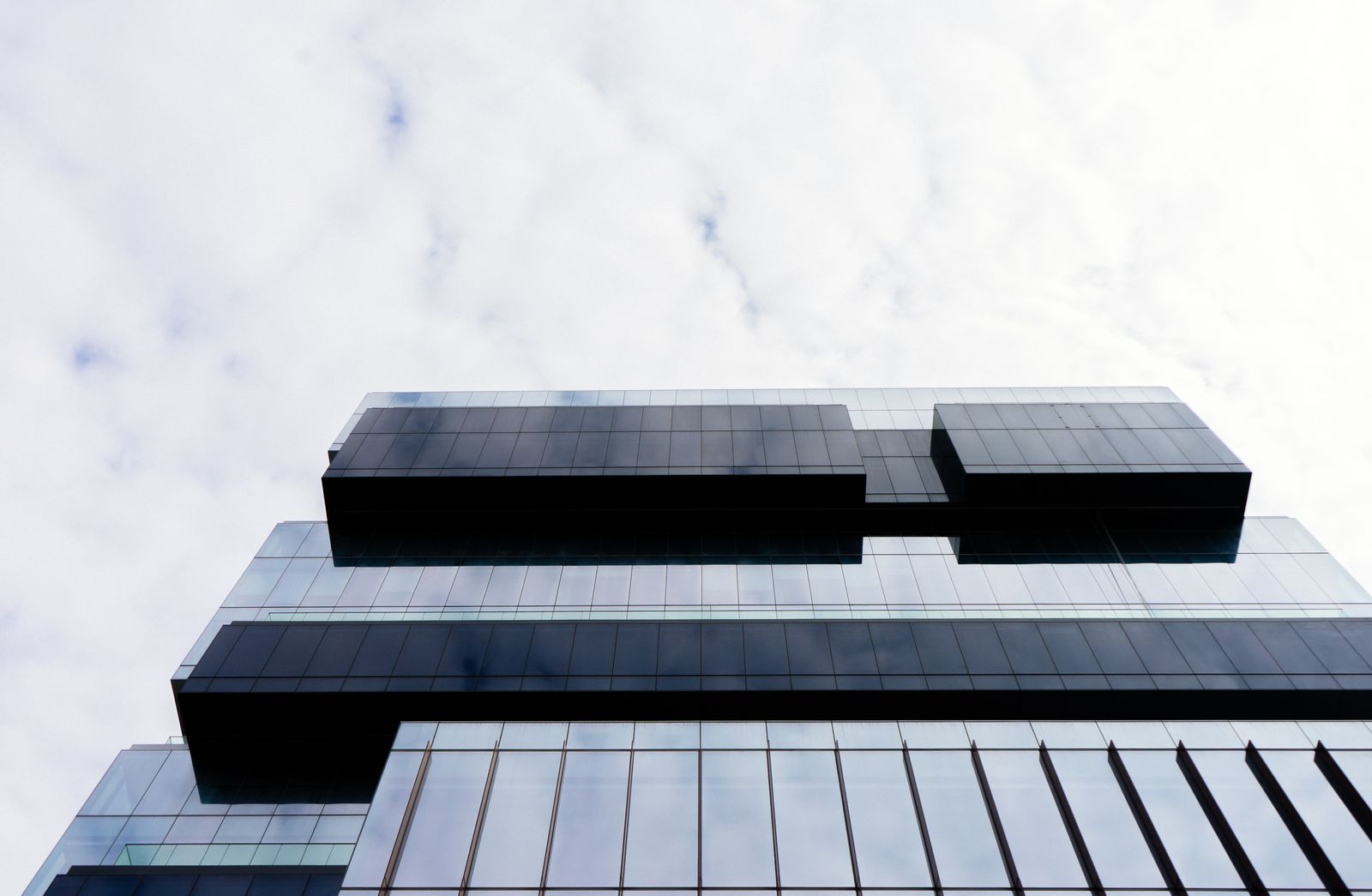 Glass office tower from below