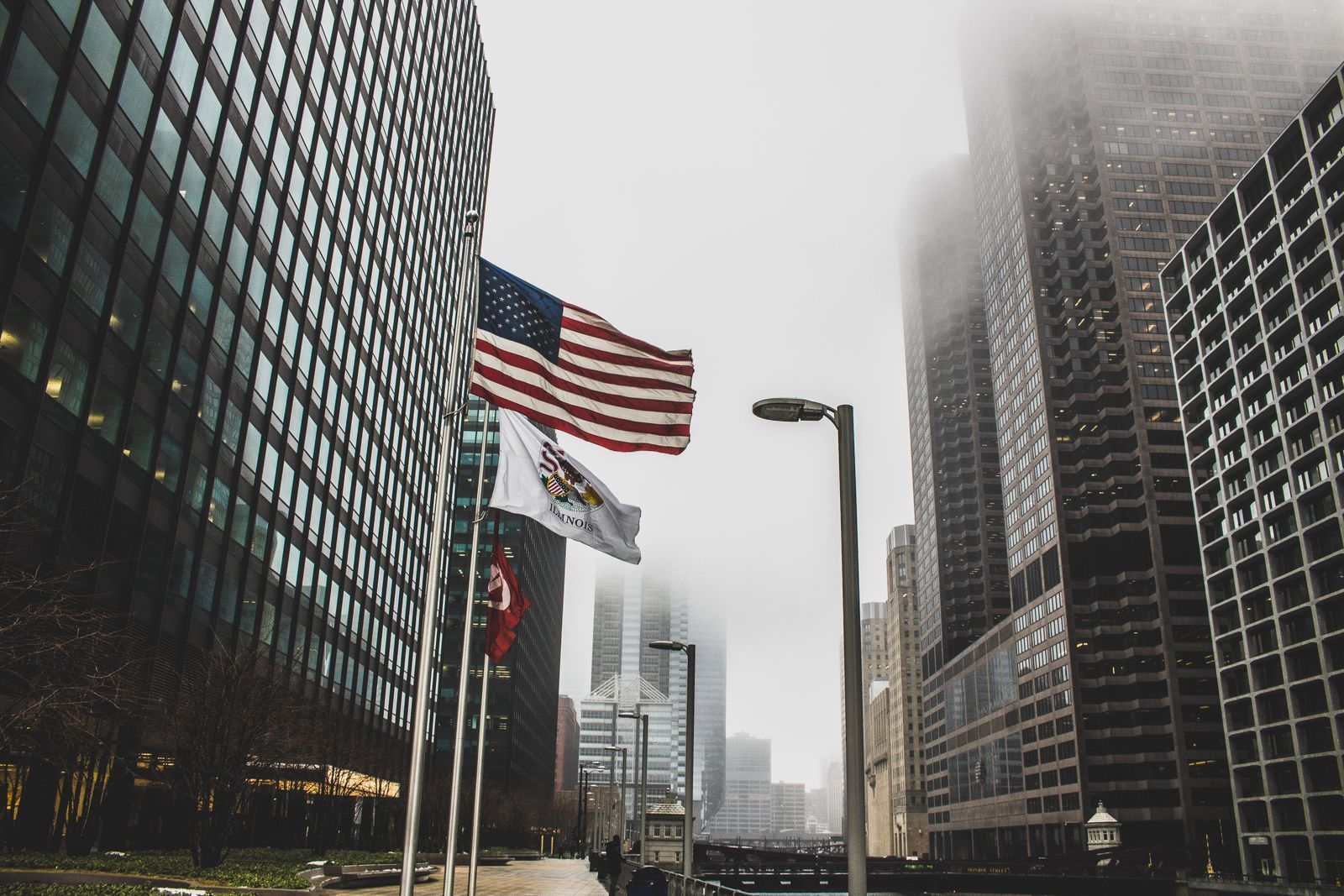 American flags between office towers